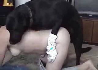 Husband films his short-haired wife getting banged by a black Labrador