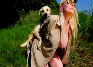 Blonde with shades has aroused Labrador buried up her moist twat
