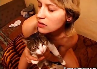 Skinny zoophile with short hair is ready to fuck her cat for the cam