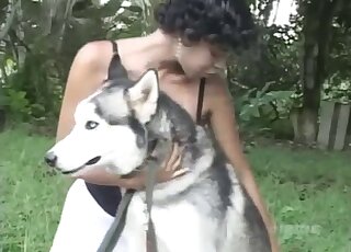 Amateur ebony babe shares intimate outdoor scenes alongside her dog