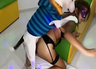 Tanned and seductive Latina getting fucked by a white dog on all fours