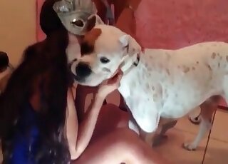 Brunette in a sexy outfit is happy to fuck a white mutt after licking