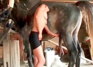 Beastiality sex craving slut gets naked to play with cock of her horse