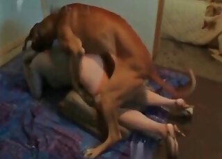 MILF stands in a doggystyle position to enjoy zoo sex with her dog