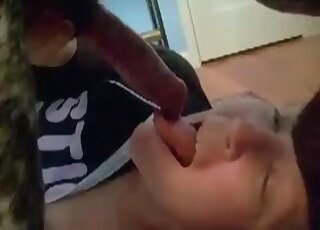 Cum-thirsty MILF deepthroats her dog’s dick and gets mouth creamed