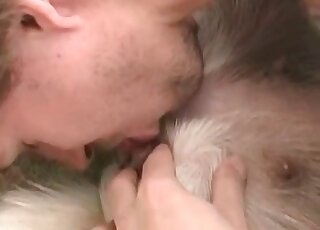 Zoophile guy licks pussy of a female dog in a hot animal sex video