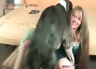 Cute long-haired mature slut gives pussy to her huge horny canine