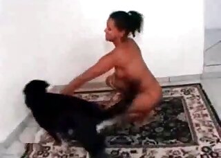 Skinny brunette wants her black dog to fuck her pussy right now