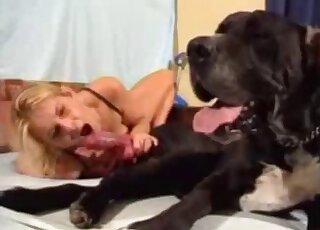 Sex tape scene showing skinny blonde that fucks her brown dog