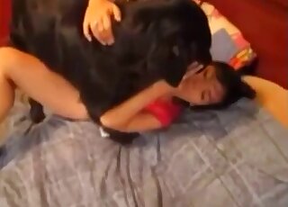 Sexy lady showing her round ass during hot sex tape scene with a dog
